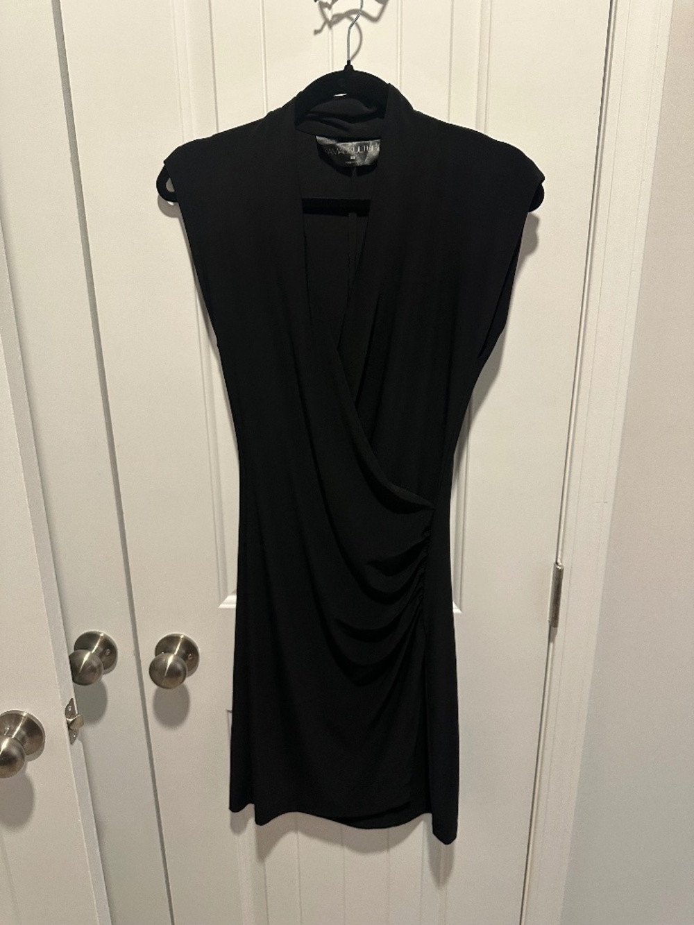 Norma Kamali black faux wrap dress.